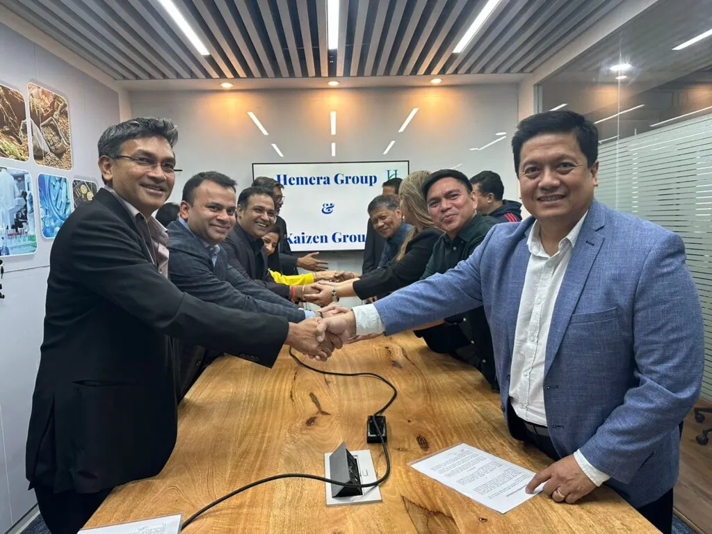 Hemera Group leadership at a partnership signing